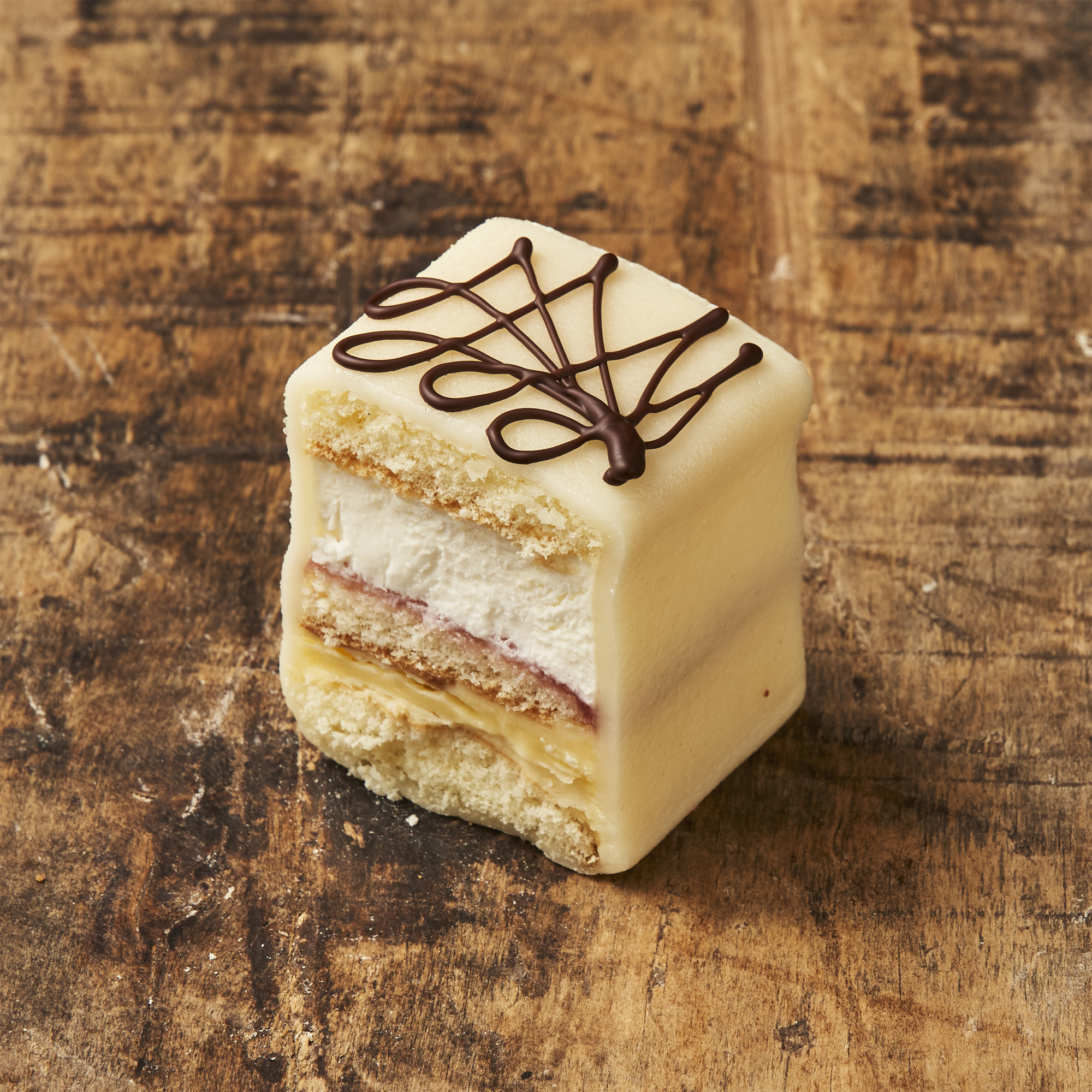 Petitfour marsepein met logo